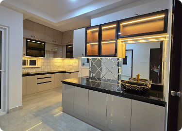Modern modular kitchen interior design in Hyderabad with island counter and warm lighting